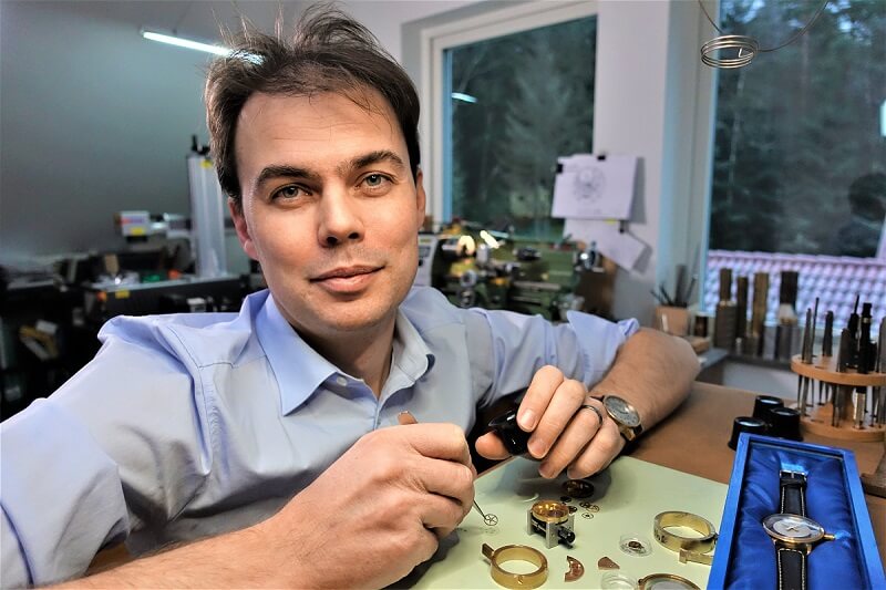 This image shows founder and watchmaker, Holme Finnilä in his workshop waiting for you to order a Levenaig watch